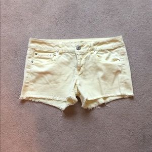Yellow denim American Eagle cutoff shorts